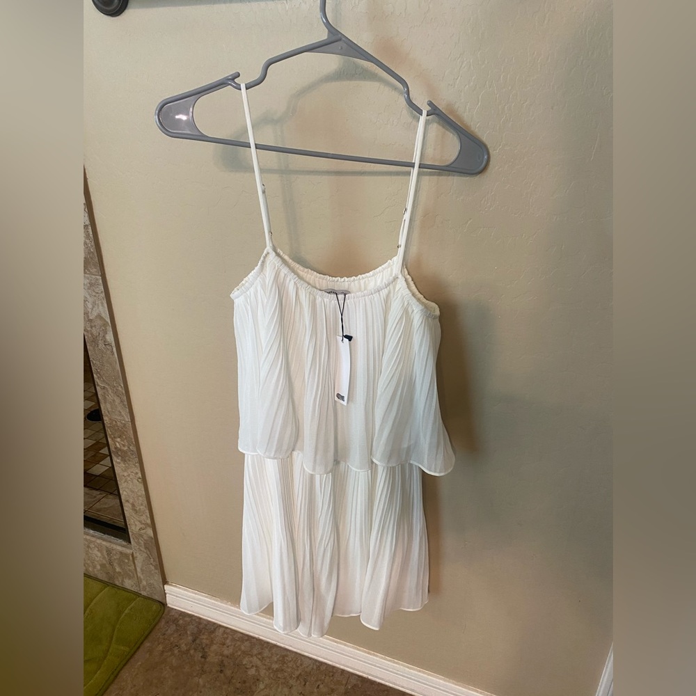 Brand new, with tags, white pleated romper